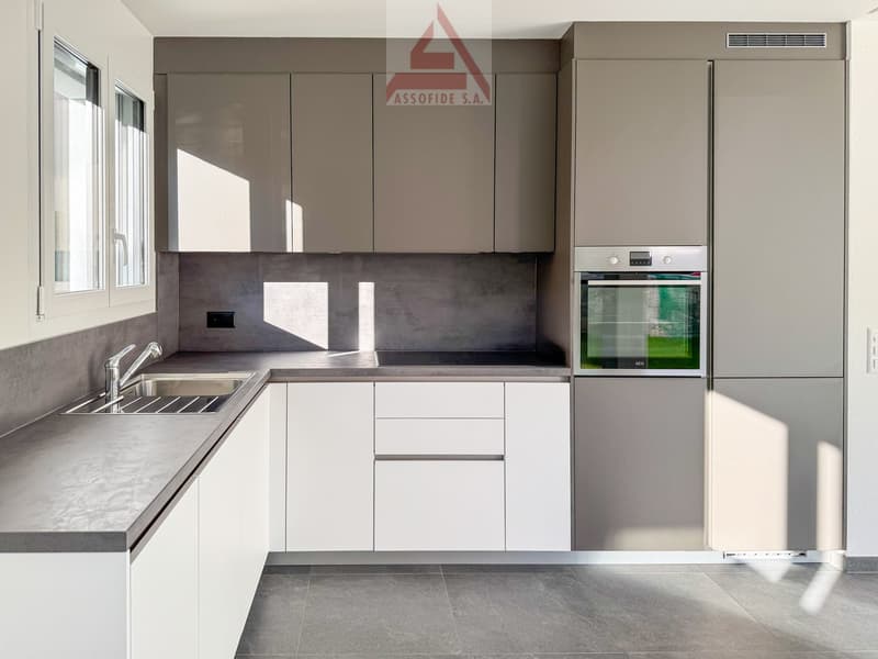 4.5 locali con giardino / 4.5 - Zimmerwohnung mit Garten (2)