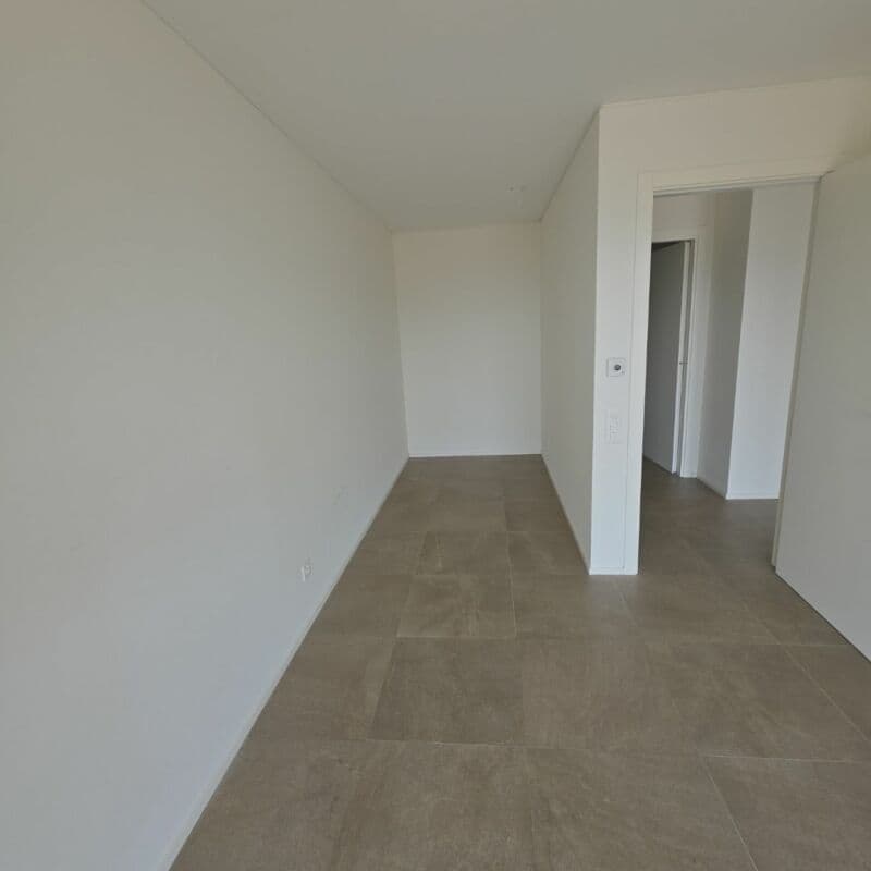 Affittasi a Bioggio 2.5 locali con vista lago e raffrescamento (8)