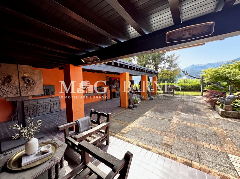 Villa d'autore a Comano con giardino e vista aperta, da rinnovare (5)