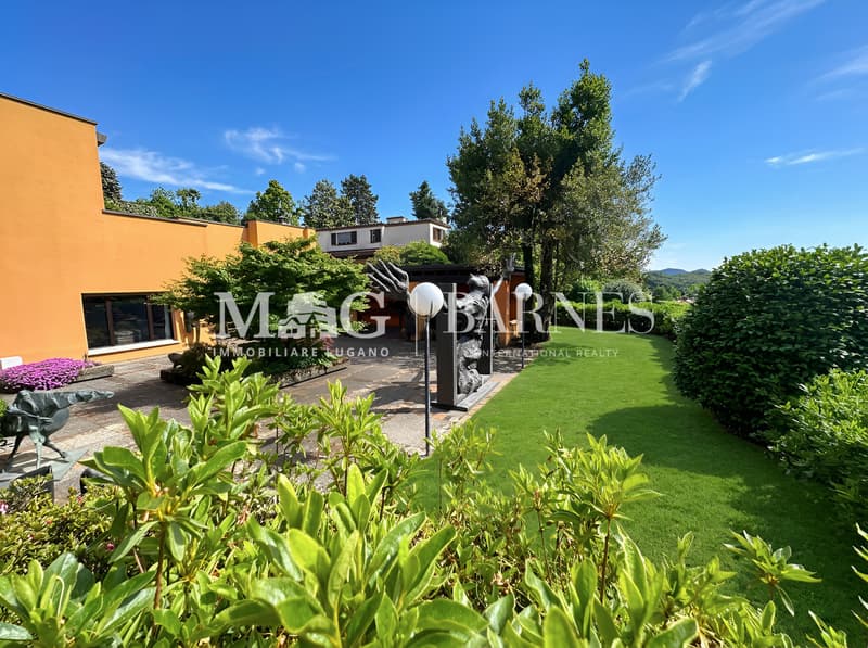 Villa d'autore a Comano con giardino e vista aperta, da rinnovare (3)