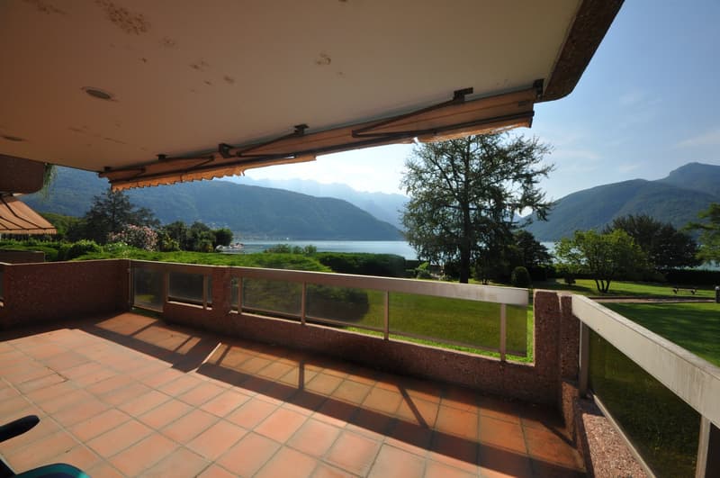 Appartamento con terrazza e bella vista sul lago di Lugano e monti circostanti (1)