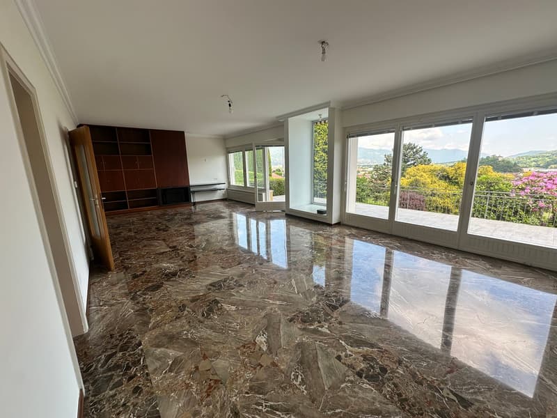 marble flooring, white walls, open layout, large windows, balcony with railings