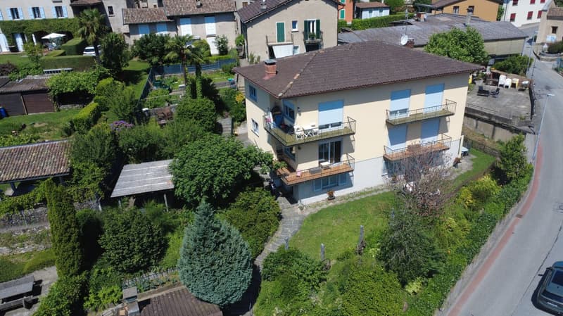 Casa plurifamiliare con ampio giardino a Comano (1)