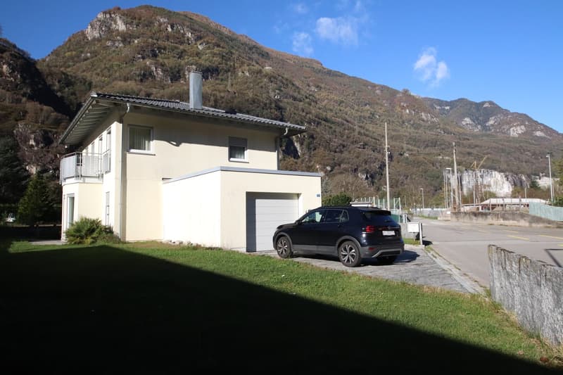 2 story house, beige exterior, garage, balcony, mountain view
