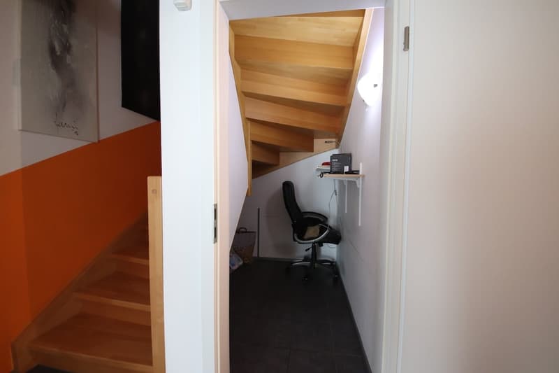 staircase, office chair, desk, computer
