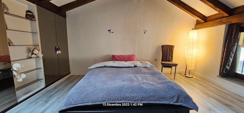 Single bed, single pillow, single blanket, lamp, chair, shelves, wall drawings, outlets