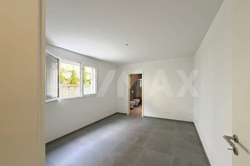 Appartamento 3.5 con giardino e 2 posti auto (11)