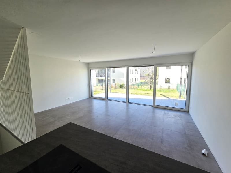 large sliding glass doors, tiled floor, staircase, no furniture