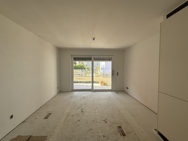 Moderni appartamenti di 2.5 locali con grande giardino in prima locazione a Cadenazzo (3)