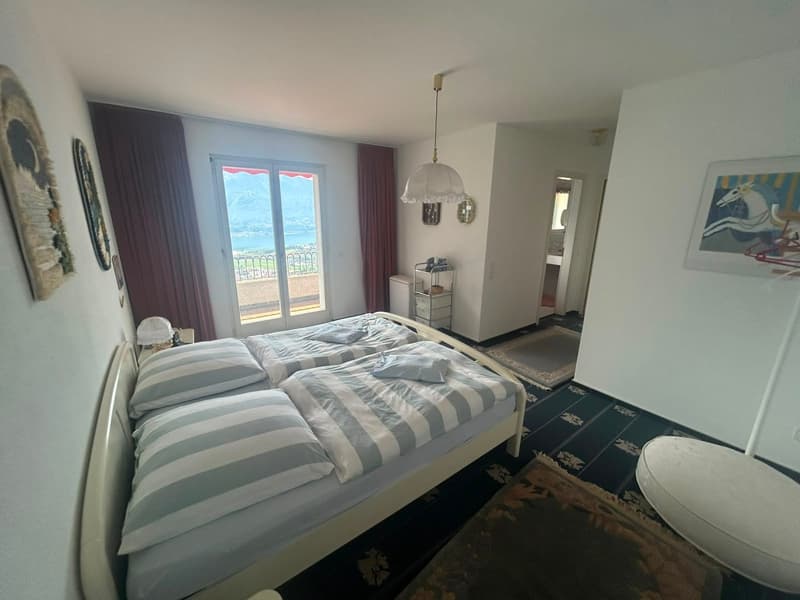 Incantevole casa unifamiliare ad Orselina con piscina e vista panoramica (15)