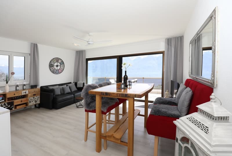 Moderne 2.5-Zimmer-Dachwohnung mit Traumblick in Orselina (4)