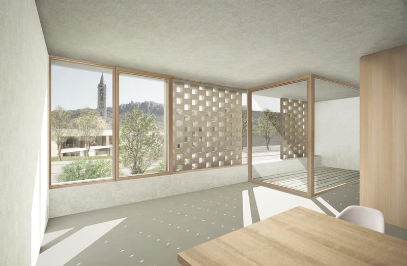 large windows, light hardwood floor, wooden desk, white chair, concrete walls, decorative window grilles
