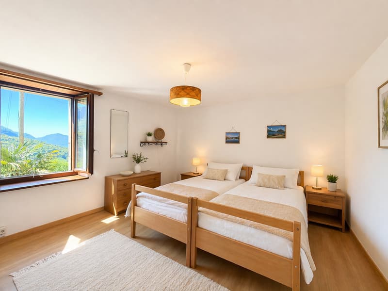 Appartamento di charme in casa Bifamiliare con giardino e stupenda vista lago e montagne (12)