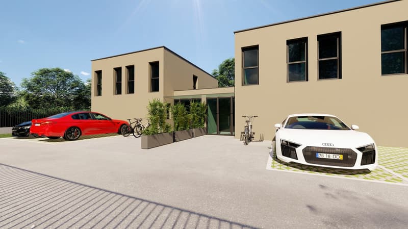 2 story house, beige, glass windows, cars parked in front, plants in the middle, bicycle parking, raised ground floor