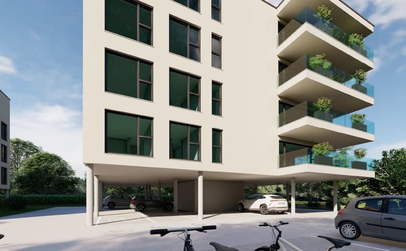 modern apartment building, white exterior, multiple floors, balconies, underground parking, outdoor parking area