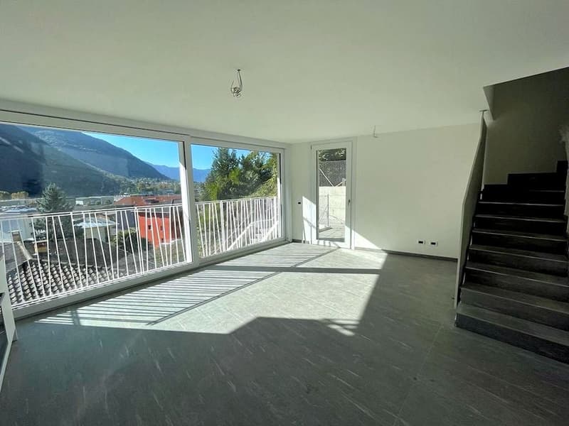 empty room, large windows, balcony, tiled floor, white walls, staircase