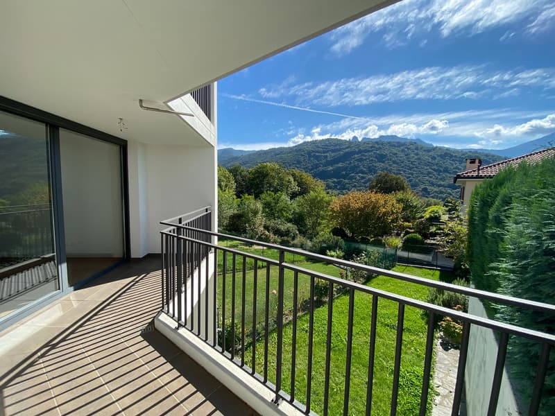 Terrace with a view of the mountains, tiled floor, metal railings, empty space, bright lighting
