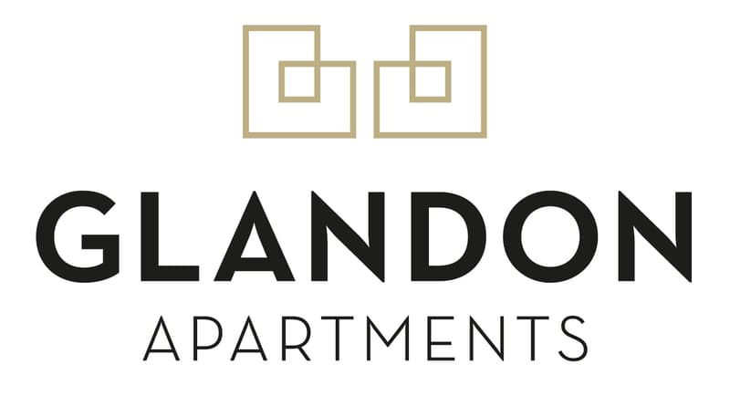 The image shows the logo for Glandon Apartments, which consists of a geometric design with two square frames and the text 'GLANDON APARTMENTS' in bold black letters.