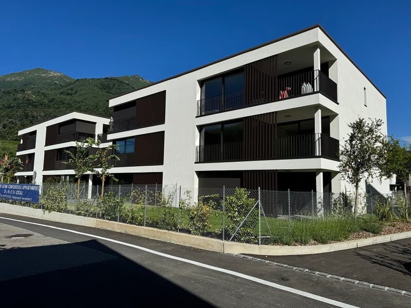 modern multistory building, white walls, brown wooden fences, balcony with railings