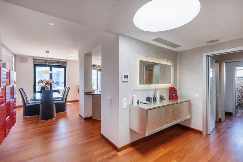 modern interior, wooden floor, white walls, large window, dining table, chairs, mirror, countertop, decorative items