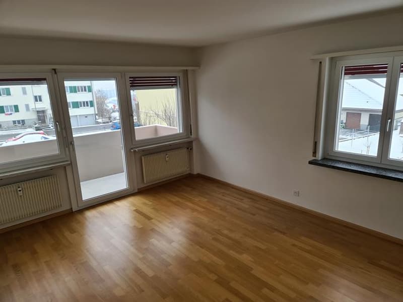 Wohnzimmer mit Balkon