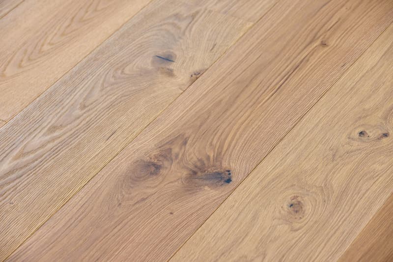 Natural oak wood, hardwood, matte finish, medium-dark tone, visible grain patterns