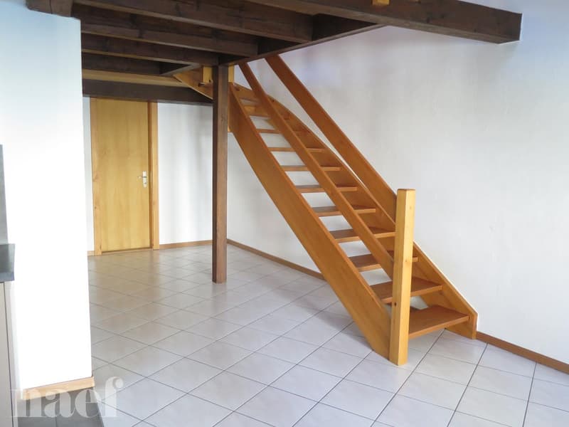 Au coeur du village de Corcelles, au dernier étage d'une maison villageoise (4)