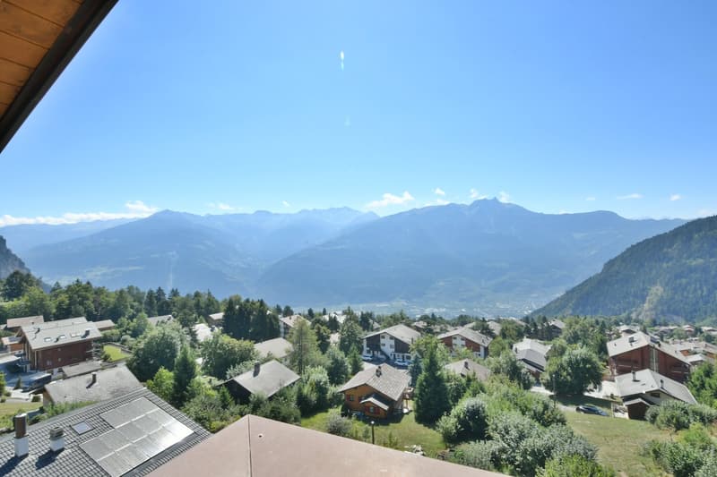 Mountains, village, houses, greenery, solar panels, road, clear blue sky, parked cars, trees, mountains