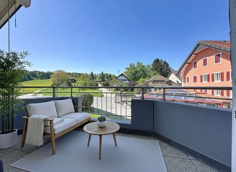 Duplex lumineux aux volumes généreux au coeur de Servion (4)