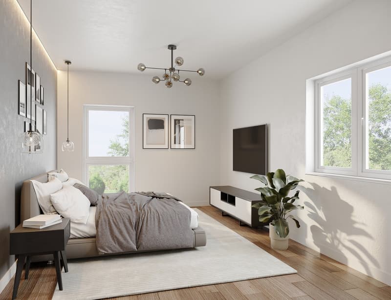 Bedroom with gray bed, chandelier, television, side tables, white rug, plant, two large windows, and wall-mounted pictures.