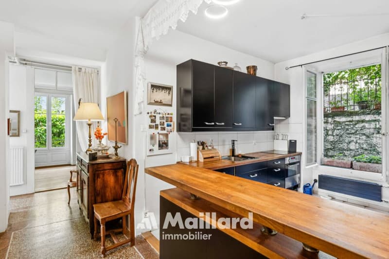 Appartement de caractère avec jardin privatif au coeur de Lausanne (6)