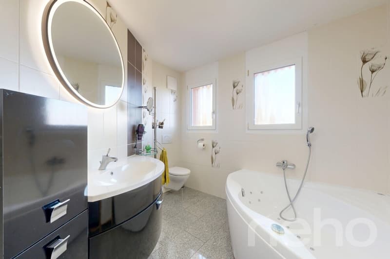 Spacieux appartement familial avec balcons et jardin à St-Prex (10)