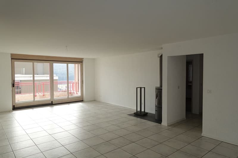 empty room, sliding glass doors, balcony, tiled floor, fireplace