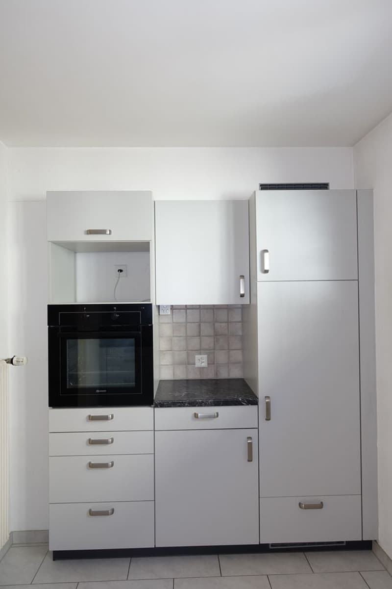 Tramelan - Maison de 2 appartements et atelier, annexe et places de parc, au centre de la localité (7)
