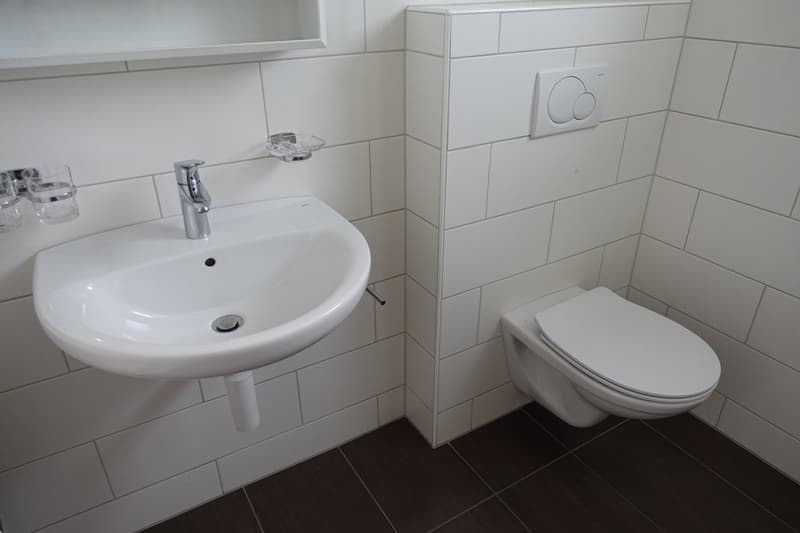 Tramelan - Maison de 2 appartements et atelier, annexe et places de parc, au centre de la localité (12)