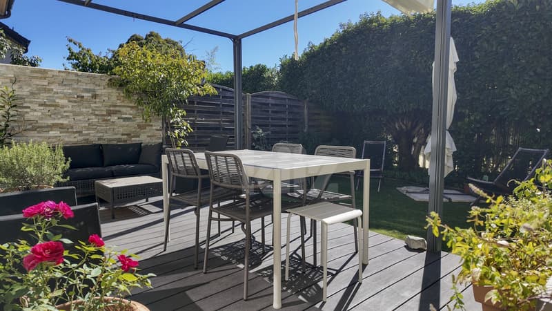 Superbe maison mitoyenne en demi-niveaux avec jardin (3)