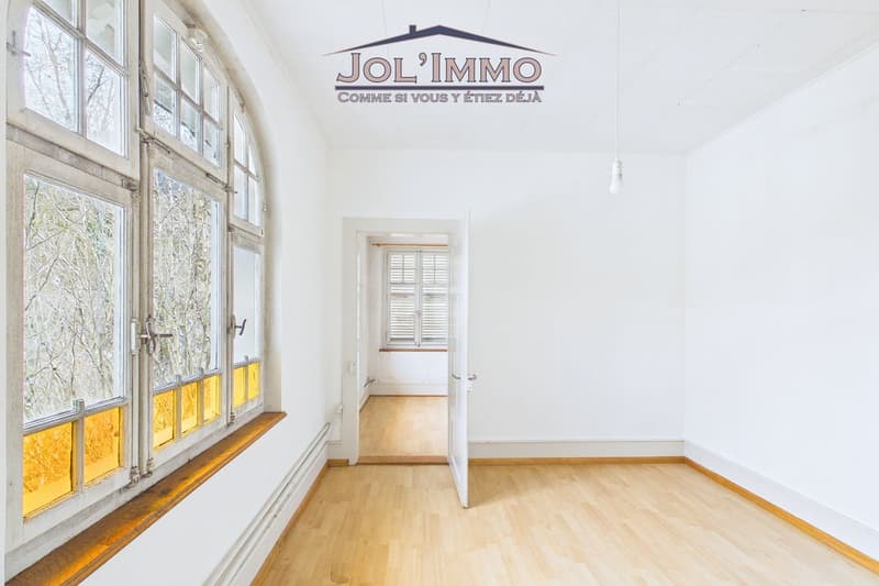 Propriété de caractère avec 3 appartements et terrain à bâtir à Perrefitte (9)