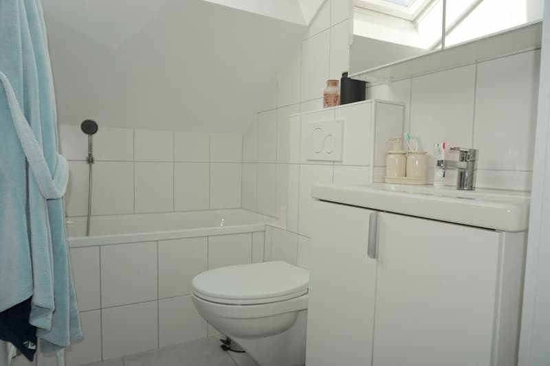 ARI-253 - Immeuble de 3 appartements, 3 garages et 2 places de parking à proximité de la gare CFF (4)