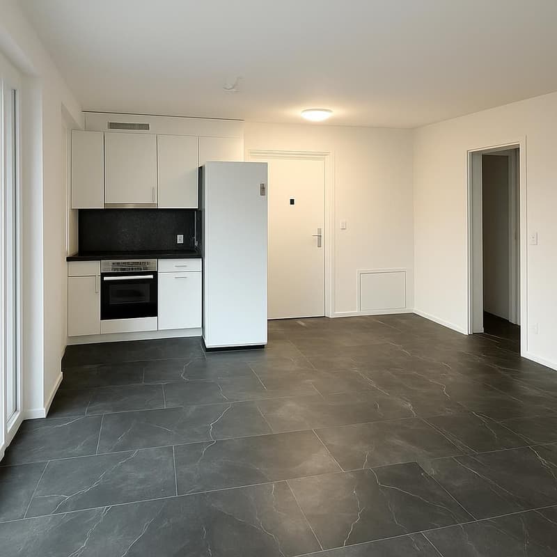 White fridge, white built-in kitchen cabinets, black tiled floor, glass door, white wall