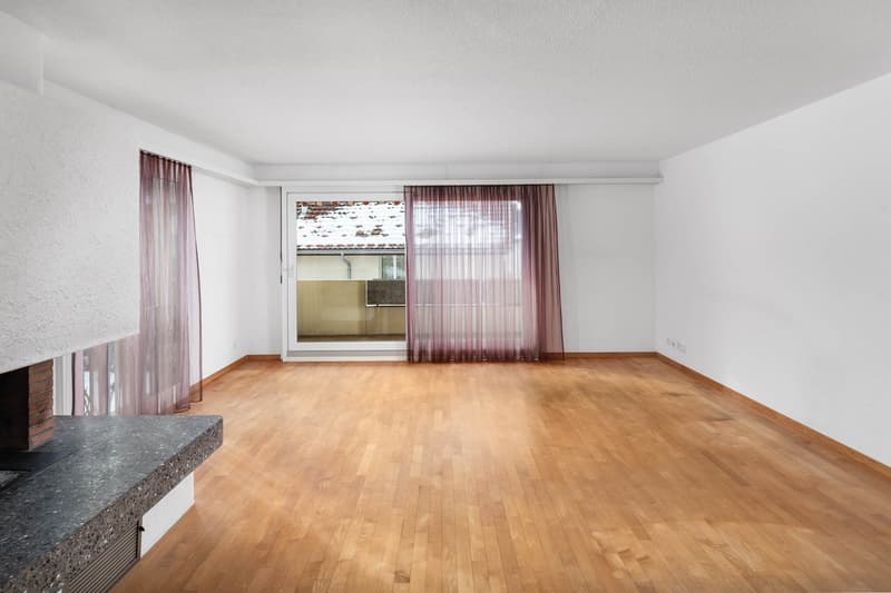 empty room, wooden floor, fireplace, glass window, glass door, white walls, red curtains