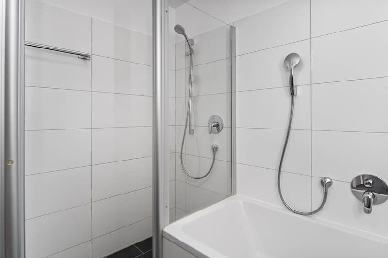 Shower enclosure, bath, shower head, faucets, tile walls