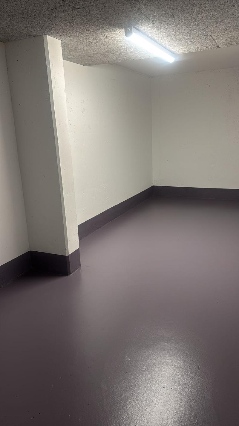 empty room, concrete floor, fluorescent light