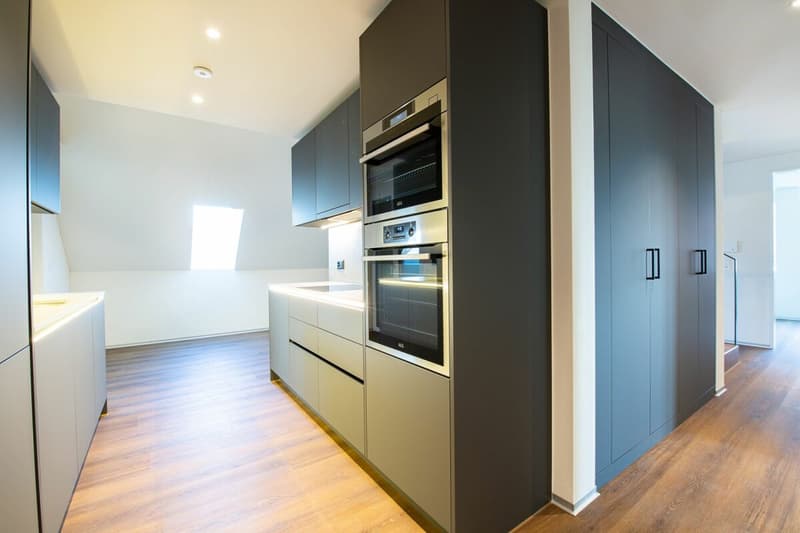 Moderne Dachgeschoss-Wohnung im Herzen von Nänikon (1)