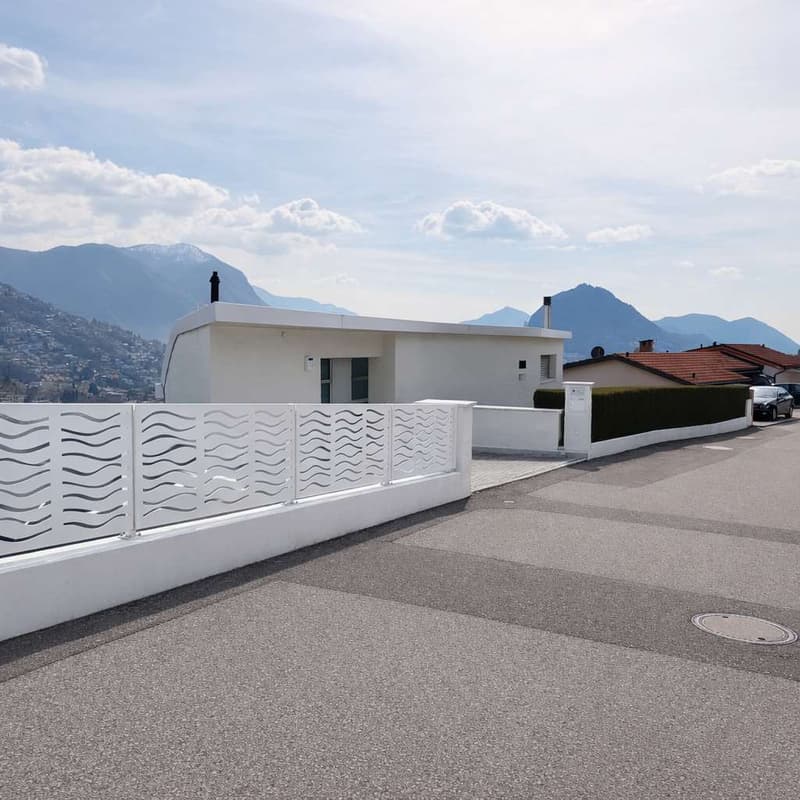 Lugano - Prestigiosa villa con vista lago e raffinati spazi esterni (3)