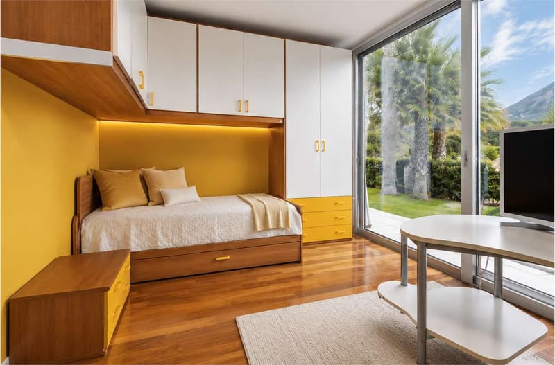 Lugano - Prestigiosa villa con vista lago e raffinati spazi esterni (9)