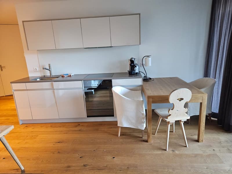 Exklusive 2.5-Zimmer Parterre-Wohnung mit Terrasse in Fidaz/Flims (1)