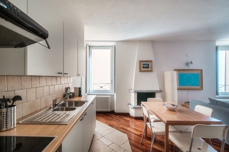 AFFITTASI GRAZIOSI MONOLOCALI IN PALAZZO STORICO A MORCOTE (1)