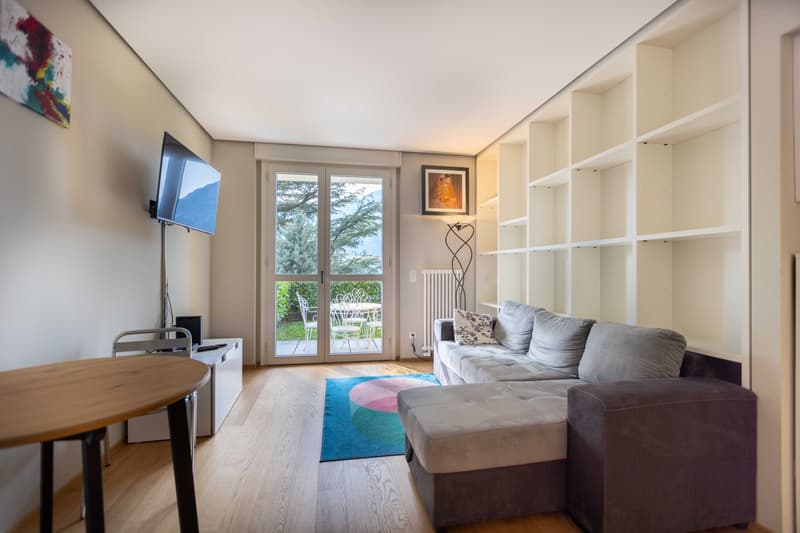 STUPENDO 2.5 LOCALI VISTA LAGO CON GIARDINO A BISSONE (3)