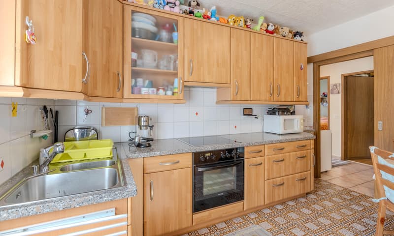 AFFASCINANTE CASA DI 4.5 LOCALI CON GIARDINO A CADENAZZO (5)