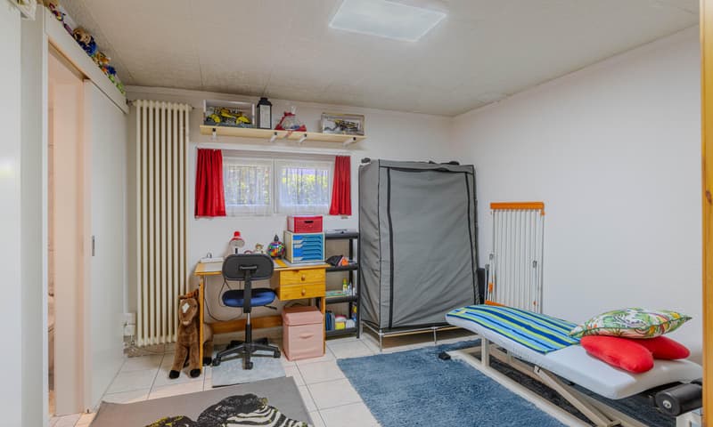 AFFASCINANTE CASA DI 4.5 LOCALI CON GIARDINO A CADENAZZO (8)